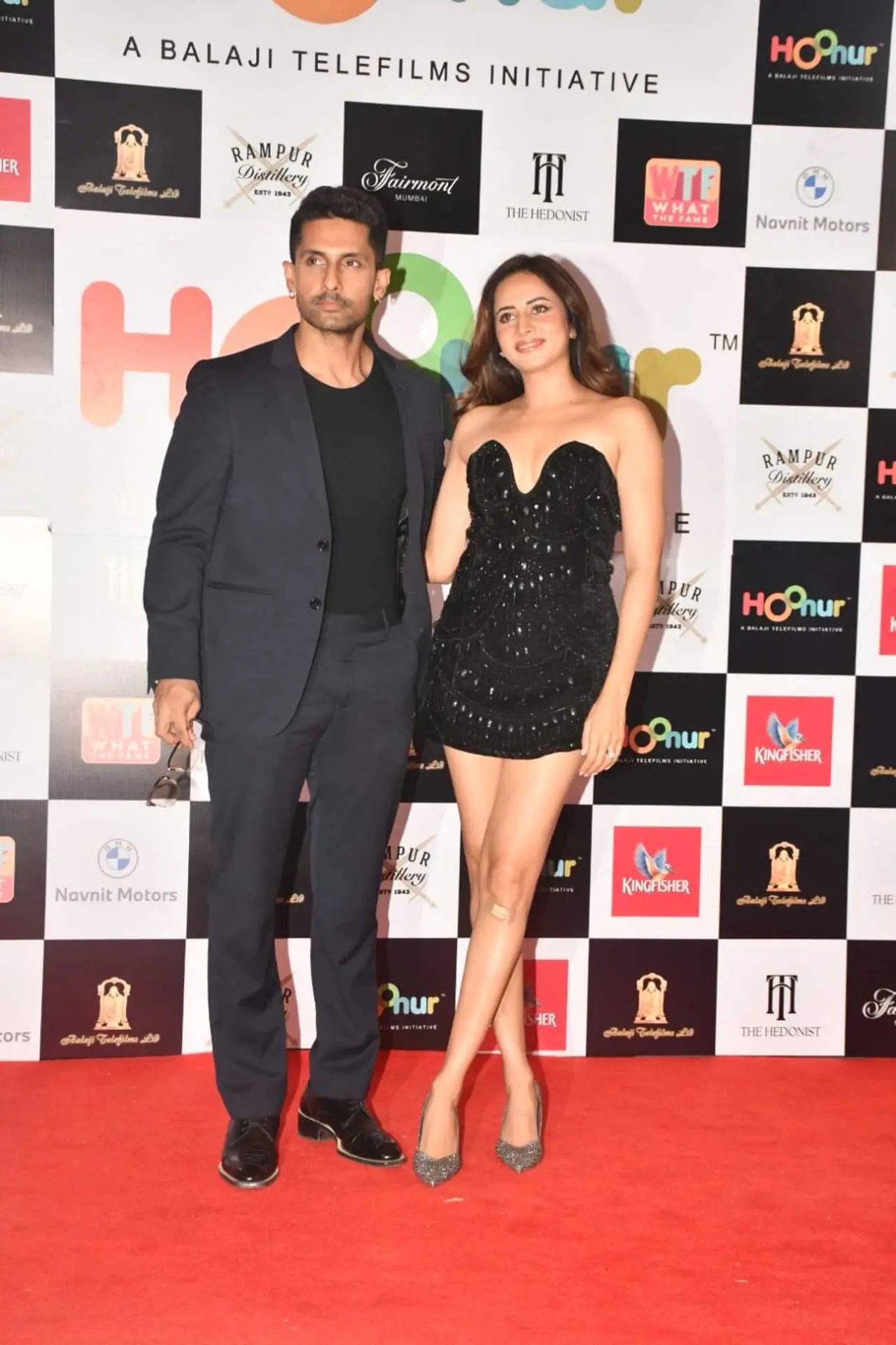 Ravi Dubey and Sargun Mehta made a stylish appearance together at the launch event of Balaji Telefilms’s new app. Ravi looked sharp in a classic black suit paired with a black T-shirt and formal shoes. Sargun complemented him in a glamorous black strapless mini dress.